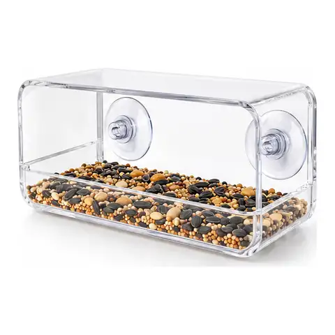 Clear acrylic Observer window bird feeder with two suction cups and an open seed tray